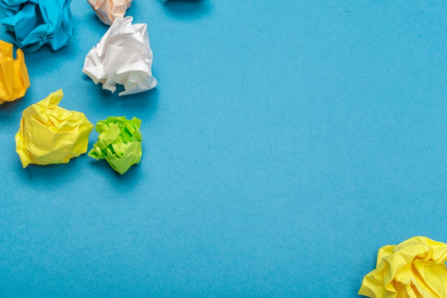Colorful crumpled paper balls. close up. creative photo.